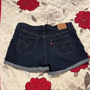 Levi's women's denim Jean cuff shorts. Has stretch to the material
